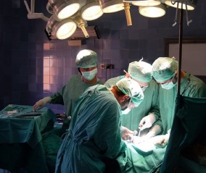 Surgery in a hospital, four doctors