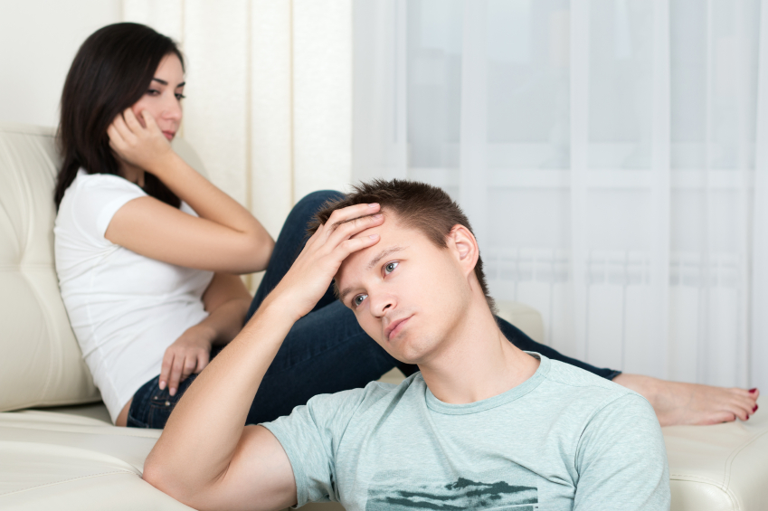 Man and woman looking stressed