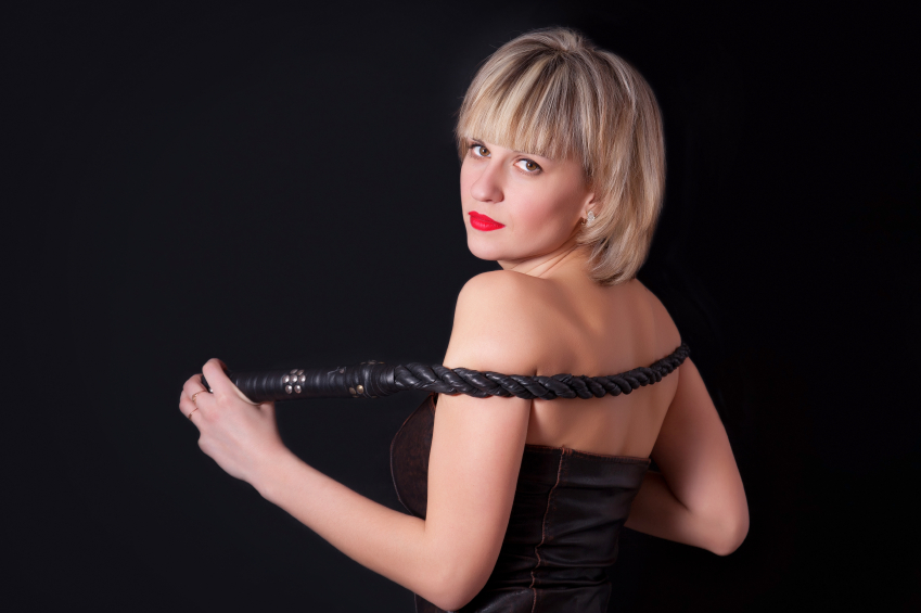 Woman with chain getting ready for rough sex