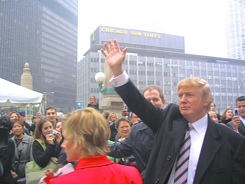 Donald Trump raises his hand