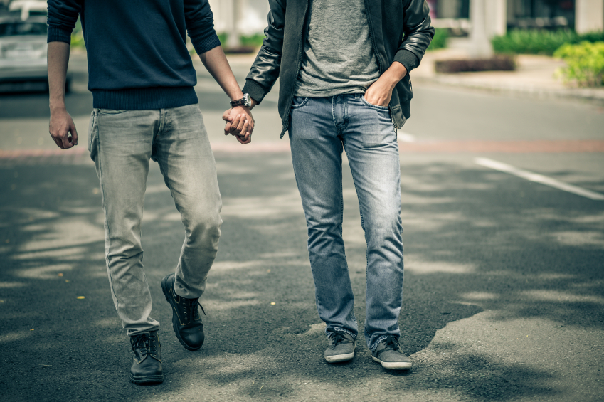 Gay men walking down the street together