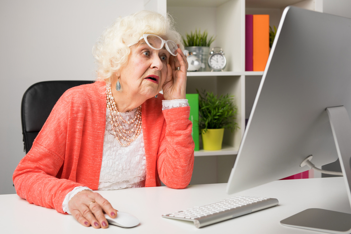 Grandma looking shocked at a computer screen