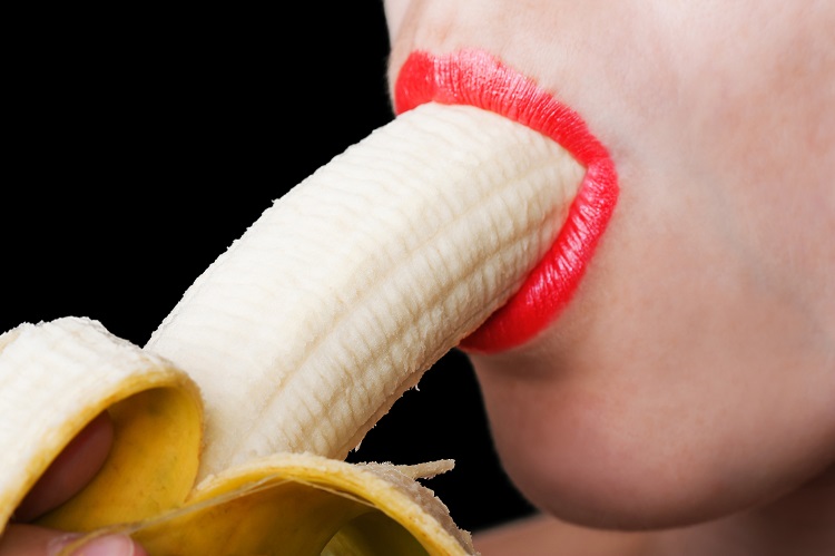 Sex concept women sucking eating banana fruit food