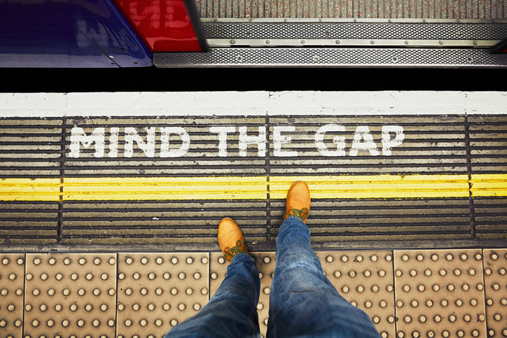 Man is waiting in underground station - London, The United Kingdom of Great Britain and Northern Ireland