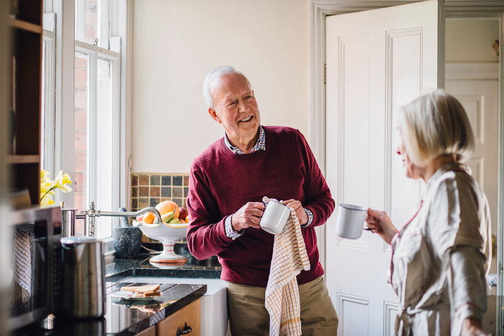 Old couple in the kitchen.