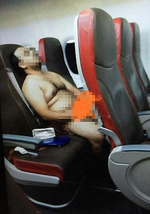 Naked man masturbating on flight